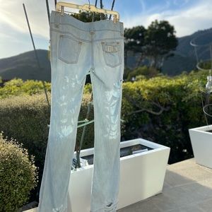 Distressed cotton flared jeans with back pocket crystal DG logo, like NEW